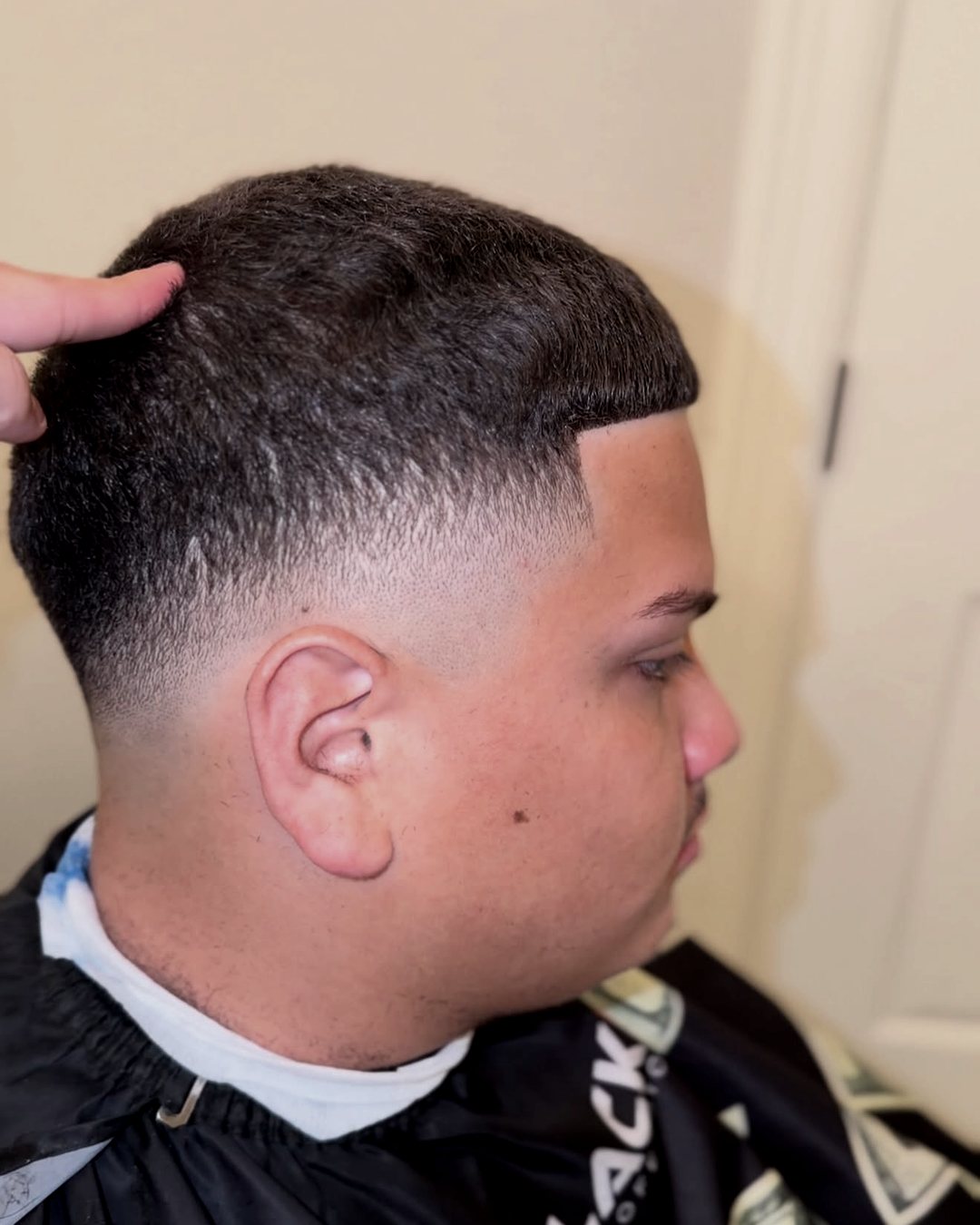 Skin fade with a hard line-up