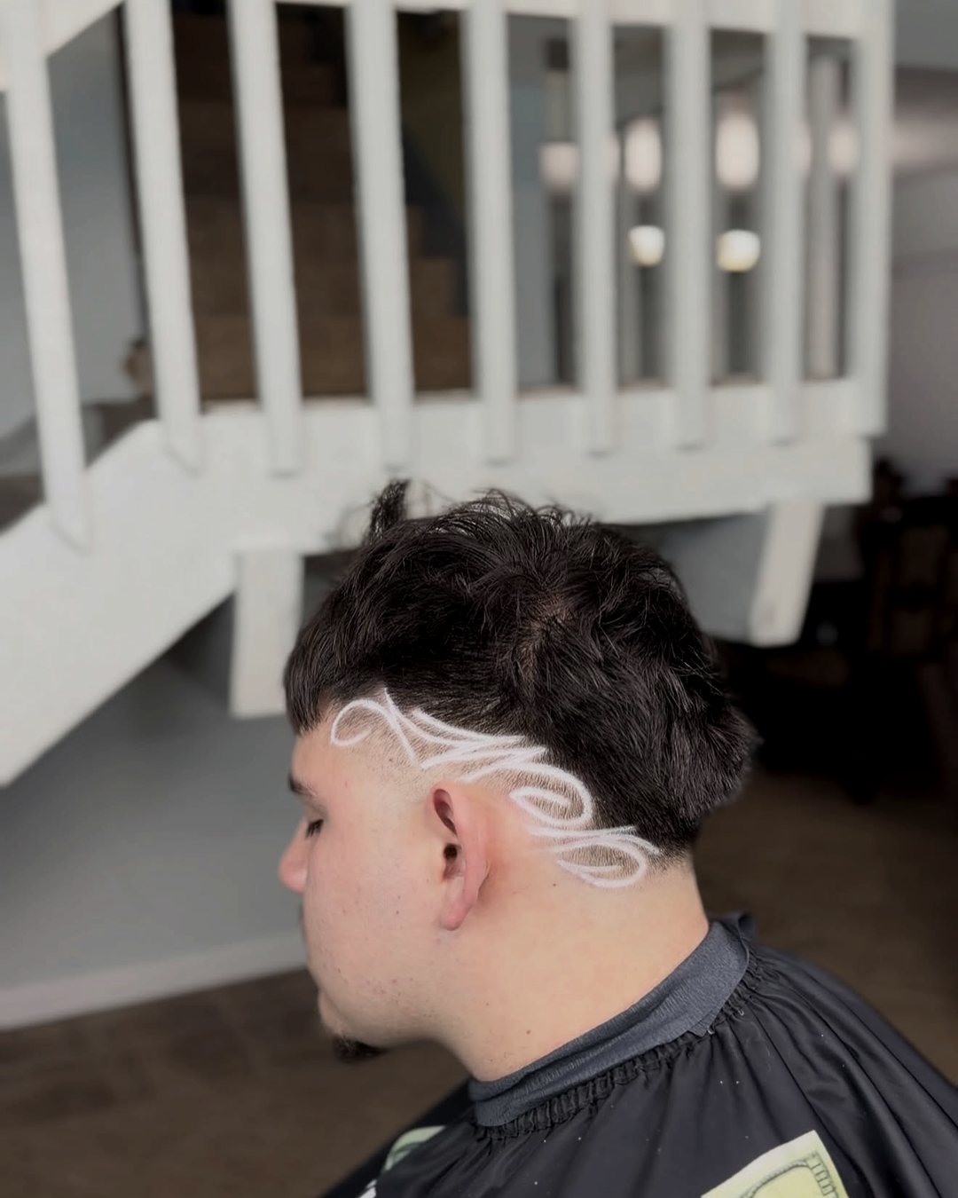 White line-work design drawn to the head