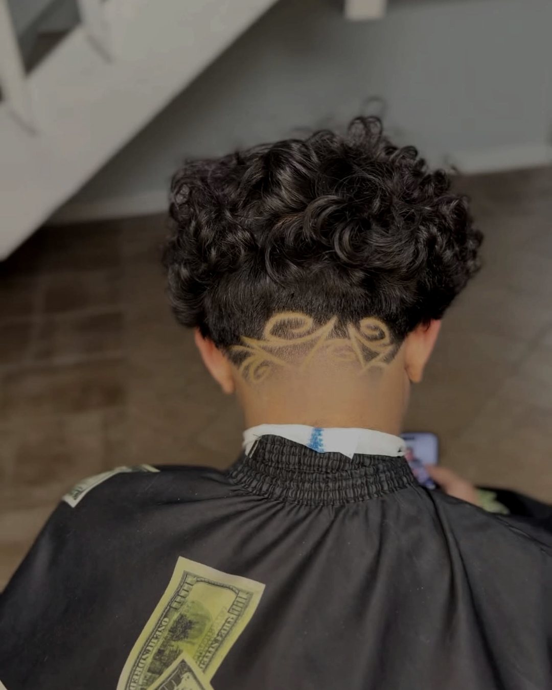 Ornamental freehand design carved into the nape